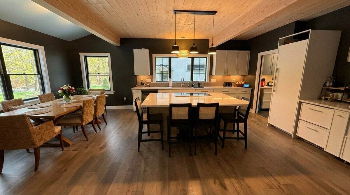 Chef's kitchen with island and dining